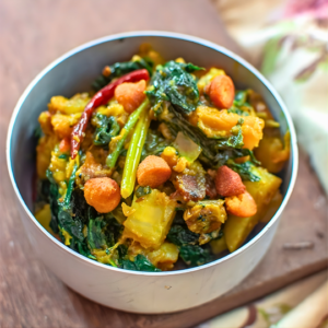 Bodi Diye Palong Shaak Ghanto (Spinach mixture with lentil dumpling)