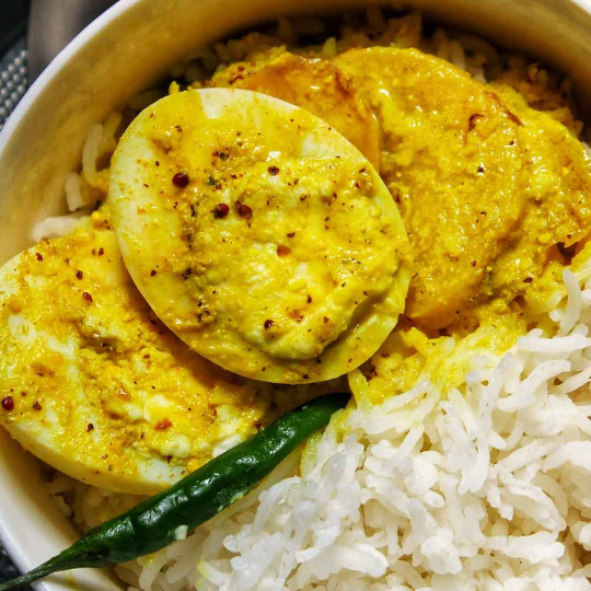 Shorshe Posto Dim (Egg Mustard Poppy gravy)