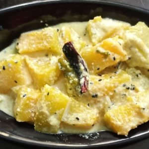 Narkel diye Dudh Kumror jhal (Milky Pumpkin stew with Coconut)