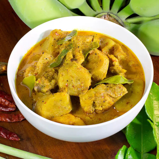 Narkel diye Kachkolar Dalna (Green Banana curry with Cococnut)