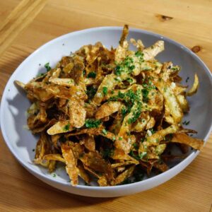 Narkel diye Aloor khosa Bhaja (Coconut mixed Potato Peel Fry)